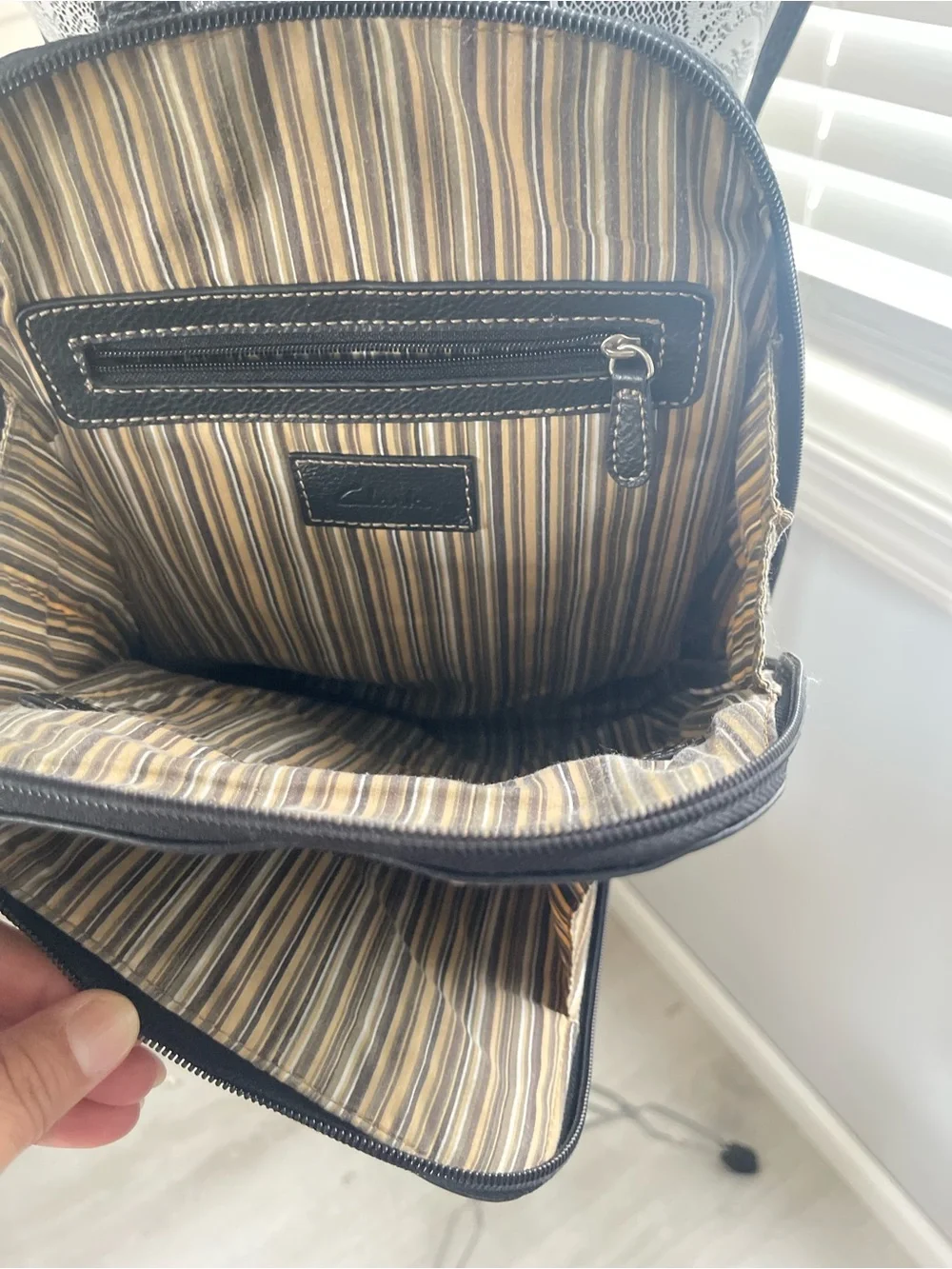 Clarks Black Pebbled Leather Backpack with Contrast Stitching